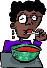 Woman eating tomato soup